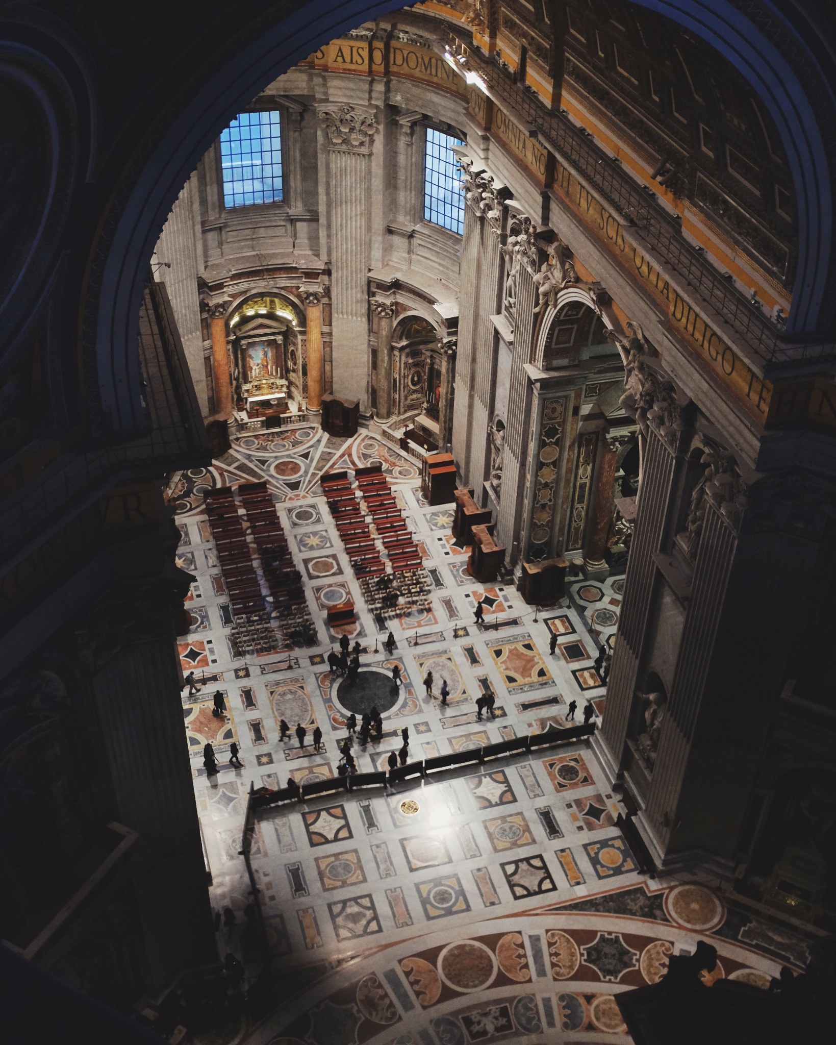 Inside Saint Peters Basilica in Vatican City, Rome, Italy looking down on floor and people